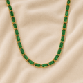 Isadora Emerald Gold Necklace featuring emerald-cut green zircon stones set in waterproof 18K gold PVD stainless steel by Maison Élyséa.