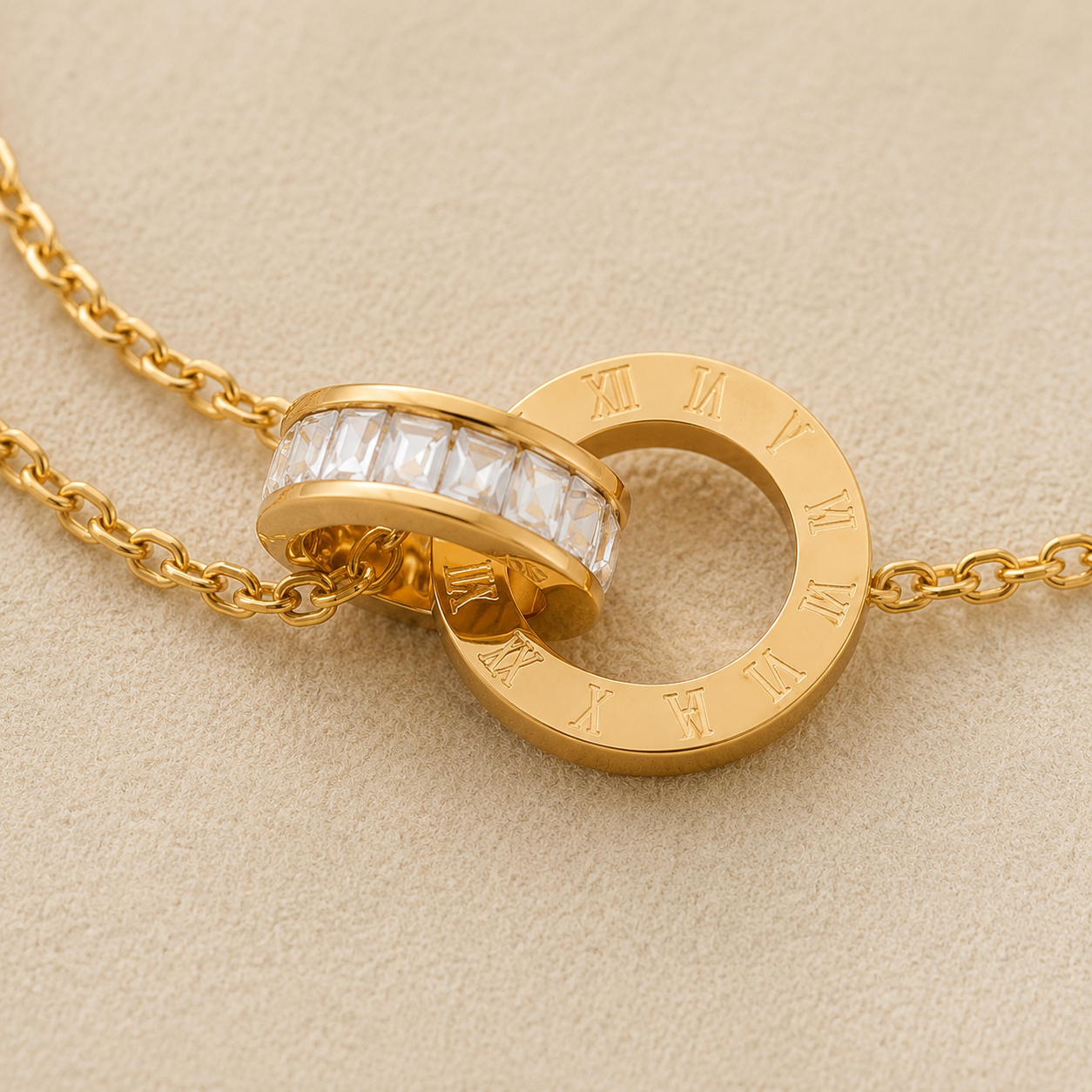 Maison Élyséa gold chain bracelet with black Roman numeral charm and crystal detail, crafted from waterproof PVD stainless steel