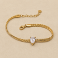 Luxury gold bracelet with sparkling white zircon stone from the Maison Élyséa Adeline Collection