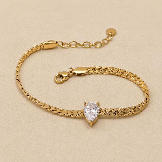 Luxury gold bracelet with sparkling white zircon stone from the Maison Élyséa Adeline Collection