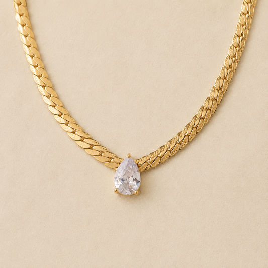 Maison Élyséa Adeline gold necklace featuring a pear-cut white zircon pendant in a waterproof PVD stainless steel setting