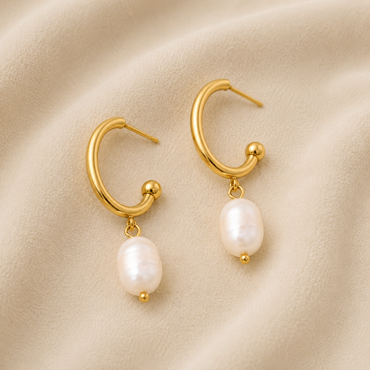 Daphne Gold Pearl Earrings with genuine freshwater pearl drops and waterproof 18K gold PVD stainless steel hoop design by Maison Élyséa.