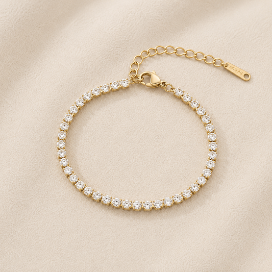 Luxury gold tennis bracelet with sparkling white zircon stones by Maison Élyséa