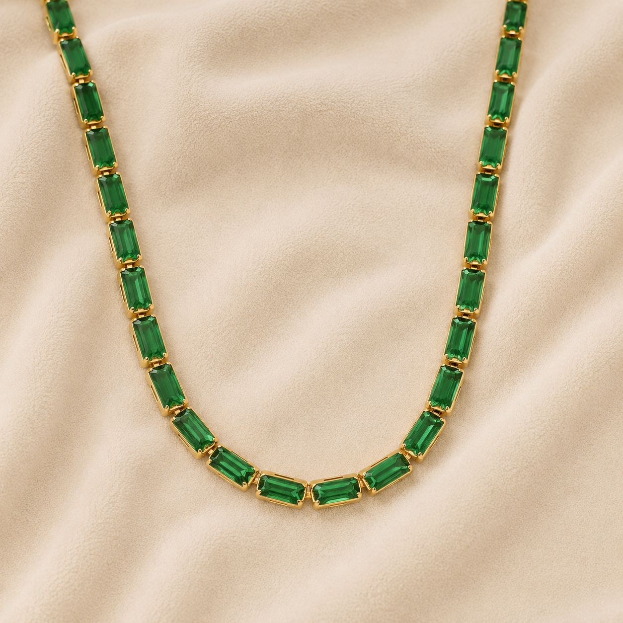 Isadora Emerald Gold Necklace featuring emerald-cut green zircon stones set in waterproof 18K gold PVD stainless steel by Maison Élyséa.