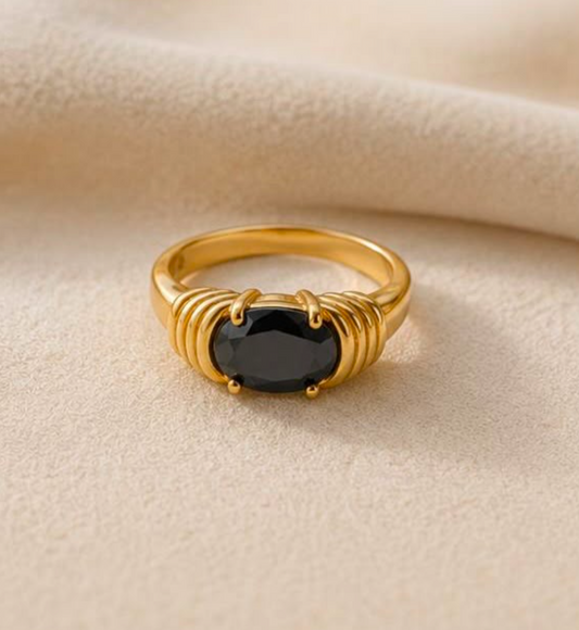 Maison Élyséa Naomi gold ring featuring a black zircon centre stone in a waterproof PVD stainless steel setting