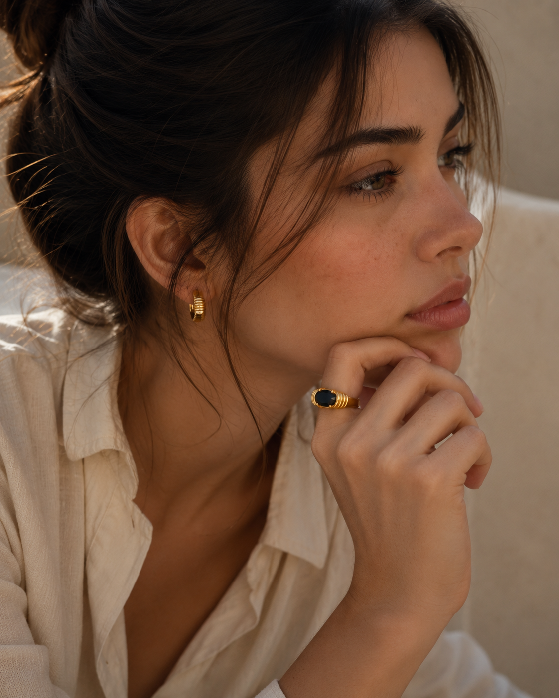 Luxury gold statement ring with black zircon gemstone from the Maison Élyséa Naomi Collection