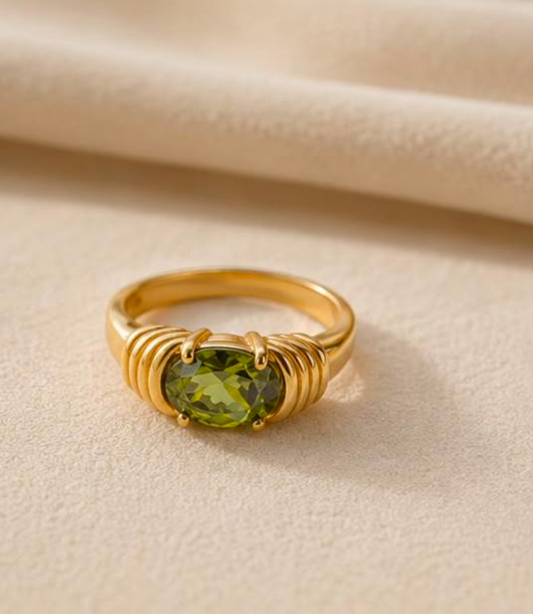 Elegant model wearing the Naomi Green Zircon Ring, showcasing luxury waterproof gold jewellery